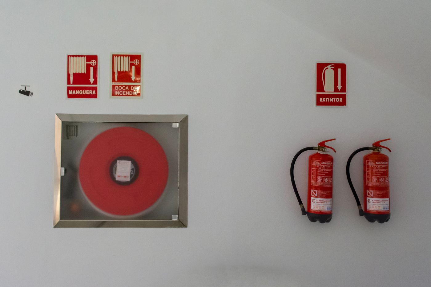 Fire safety equipment including extinguishers and hose reel